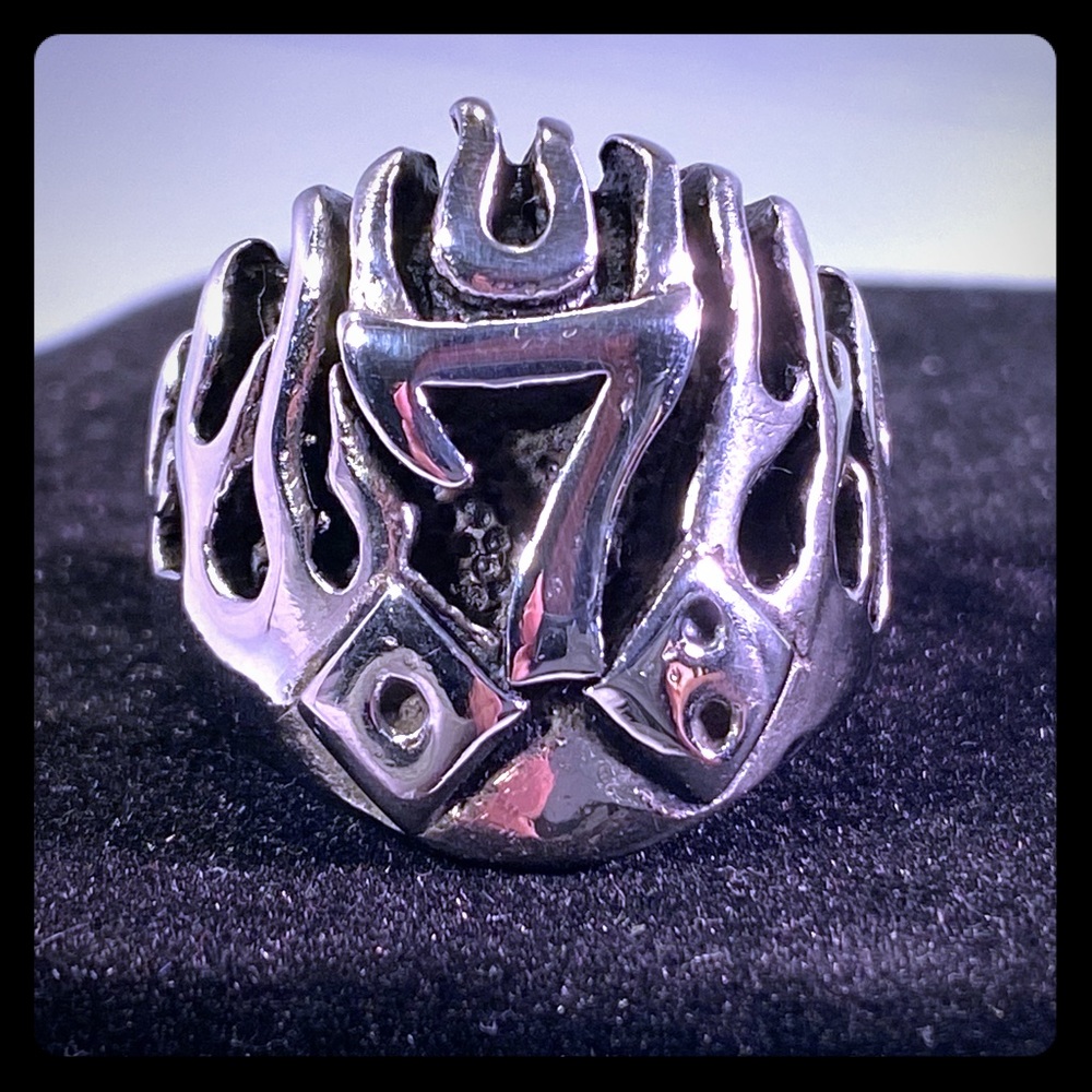 Lucky seven with dice in flames ring